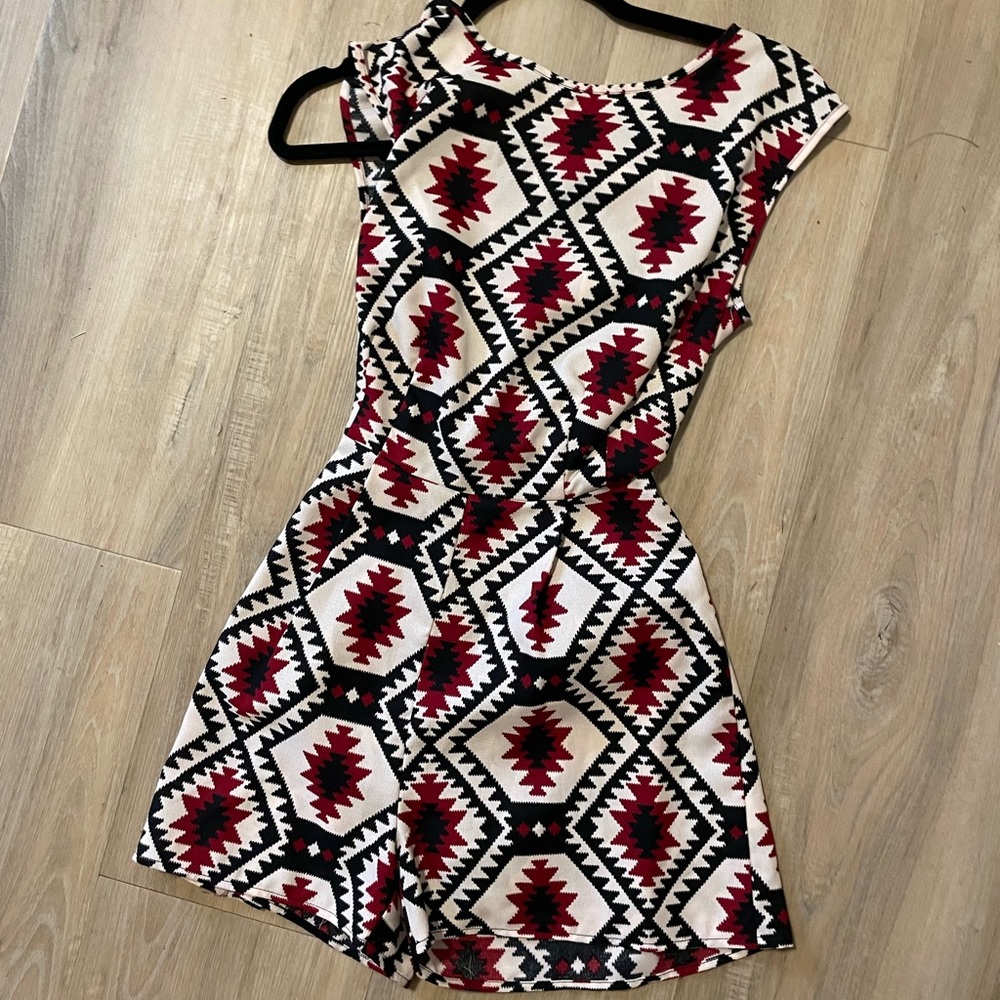 Red/black open back romper from boutique